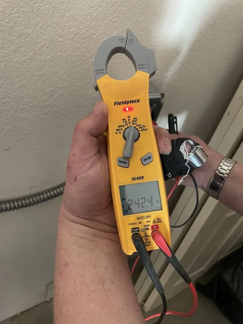Voltage testing with clamp meter during Generator Installation in Altoona
